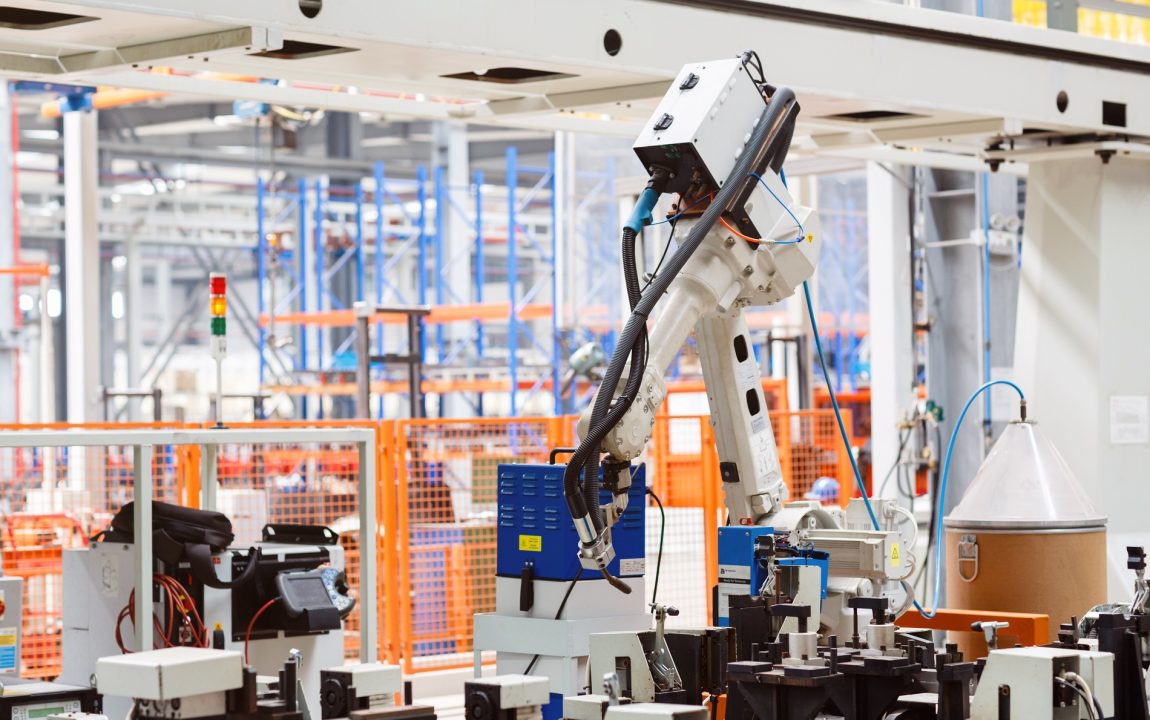 industrial-photo-of-robot-working-in-modern-factor-2023-11-27-05-20-17-utc